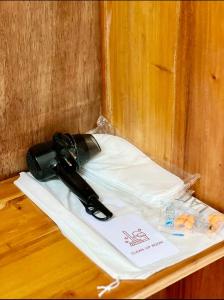 a camera sitting on top of a table at Mahika Guest House Siquijor in San Juan +17 photos