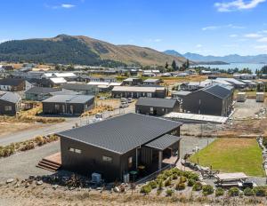 an aerial view of a small town with buildings at Sefton View in Lake Tekapo