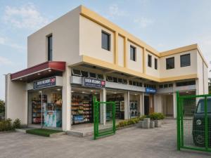 a store front with green gates in front of it at Green Meadows Residence Naga in Milaor