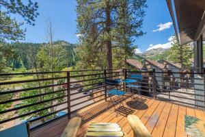 a balcony with a view of the mountains at Alpenglow Loft condo in Olympic Valley