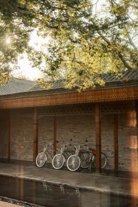 a group of bikes parked on a building at Mandarin Oriental Qianmen, Beijing in Beijing +73 photos