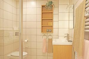 a bathroom with a toilet and a sink and a shower at Chambre d'Hôtes La Chadeleufade in Chadeleuf +14 photos