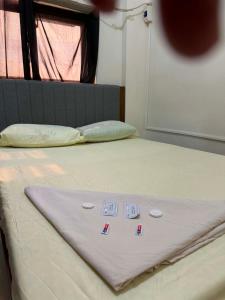 a close up of a bed in a room at DC Travellers Inn Unit E 3rd Fl in Malolos