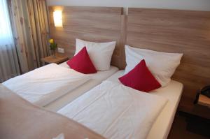 Postel nebo postele na pokoji v ubytování Hotel Schützenburg