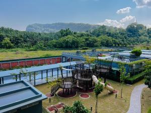 a view of a water park with a slide at Trival Property Homestay Sri Indah Sandakan in Sandakan +13 photos