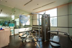 a fitness room with a gym with a treadmill at Hyatt Place Bangkok Sukhumvit 24 in Bangkok