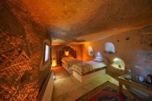 an overhead view of a bedroom with two beds at Coco Cave in Göreme