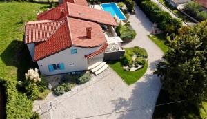 an aerial view of a house with a red roof at Casa Cavi Istria in Oprtalj