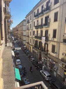 a view of a city street with cars and buildings at Coremi Naples in Naples