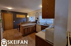 a kitchen with a sink and a counter top at Great place to see the solar eclipse! in Patreksfjörður