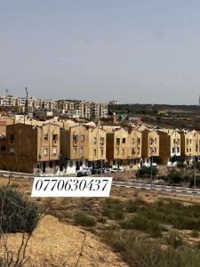 a view of a city with buildings in the background at حي السلام سيدالمجدوب in Sidi Mohammed Medjoub
