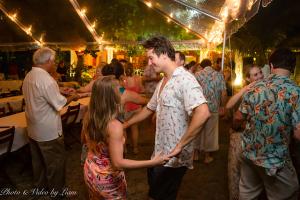 a group of people dancing at a party at Oualie Beach Resort in Nevis +40 photos