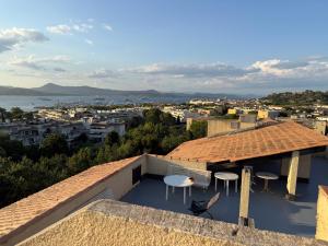 a view of the city from the roof of a house at Apparthotel Saint Tropez centre in Saint-Tropez