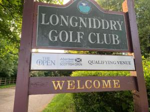 a sign for the liverpool golf club on a trail at Greenkeepers Rest in Longniddry