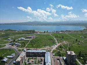 an aerial view of a city and a lake at Family House in Sevan