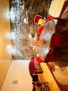 a room filled with lots of wine glasses at Qedani in Ch'k'valeri