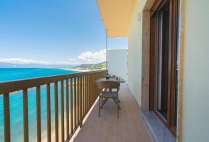 a balcony with a table and a view of the ocean at Casa Alexandr Azzurra in Pizzo