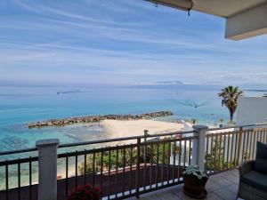 a balcony with a view of the ocean at Casa Alexandr Piedigrotta in Pizzo