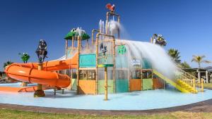 a water park with a water slide at The Kingdom Resort in Ledig +38 photos