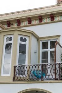 Een balkon of terras bij Casa das Palmeiras Charming House - Azores 1901