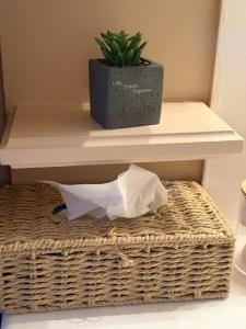 a basket and a plant sitting on a shelf at All seasons Mountain escape in Vília +34 photos