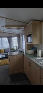 a kitchen with a sink and a counter top at The Joanack Breeze in Withernsea