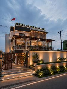a house with lights on the side of it at Hotel Rudransh in Rānchī