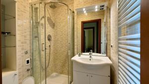 a bathroom with a sink and a shower at Casa Ada in Termoli +13 photos