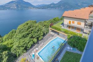 an aerial view of a house with a swimming pool at Veloccino del Lago in Perledo