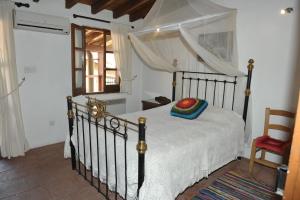 Postel nebo postele na pokoji v ubytování Zangoulos Villa
