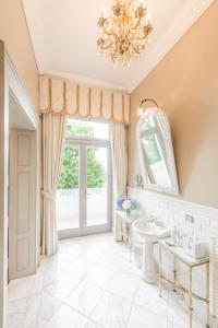 a bathroom with a sink and a mirror at Chateau Mcely in Mcely +54 photos