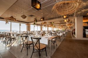 Restaurant o un lloc per menjar a Axis Ofir Beach Resort Hotel