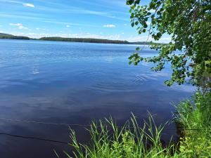 a view of a large body of water at Honkala Cottage in Keyritty +1 photo