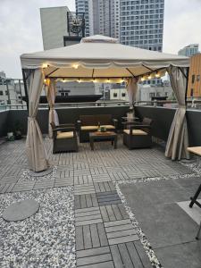 a gazebo on the roof of a building at T hotel in Seoul