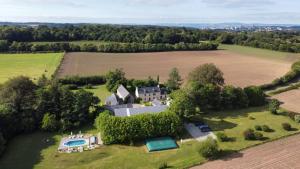 an aerial view of a large house in a field at Écrin de la baie Chambre Raphaël in Pouldergat