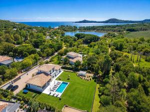 an aerial view of a house with a swimming pool at Villa Déoni in Zonza