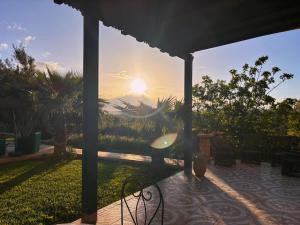 a view of the sunset from the patio of a house at Dar Mimosa in Essaouira