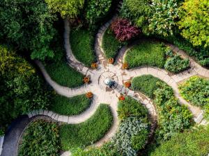 an aerial view of a garden with a stone path at Ghyll Cottage - Uk51667 in Leyburn