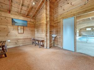 a large room with a table and a pool at Byre - Uk49899 in Blandford Forum +35 photos