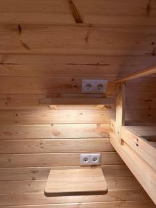 an inside view of a sauna with wooden walls at POD mit Bad 84 in Hüde