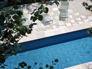 an overhead view of a swimming pool at Les Hauts de Sancerre in Sancerre