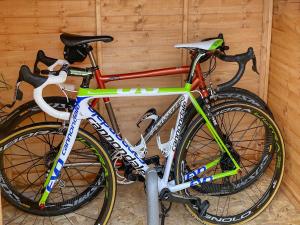 two bikes parked next to each other against a wall at Night Sky Cottage in Kielder
