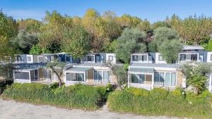 an aerial view of a house on the beach at Baia Holiday Gardasee in Moniga