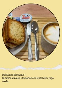 a table with a plate of toast and a cup of coffee at PM departamentos in San Rafael