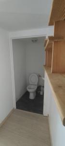 a bathroom with a toilet in a room at Le Mazet in Nohèdes