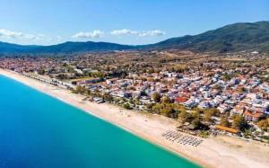 an aerial view of a resort on a beach at GL House in Asprovalta