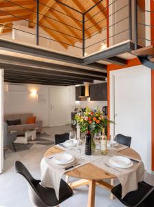 a dining room with a table and chairs at Casa Quadrifoglio - Ticino in Intra
