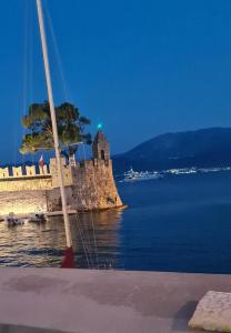 a castle in the middle of the water at View By the Castle Nafpaktos in Nafpaktos