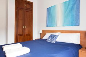 Posteľ alebo postele v izbe v ubytovaní Hello Málaga Flat Delicias