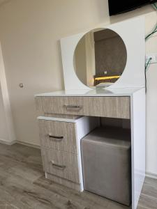 a dressing table with a mirror on top of it at Paradise House in Pamukkale